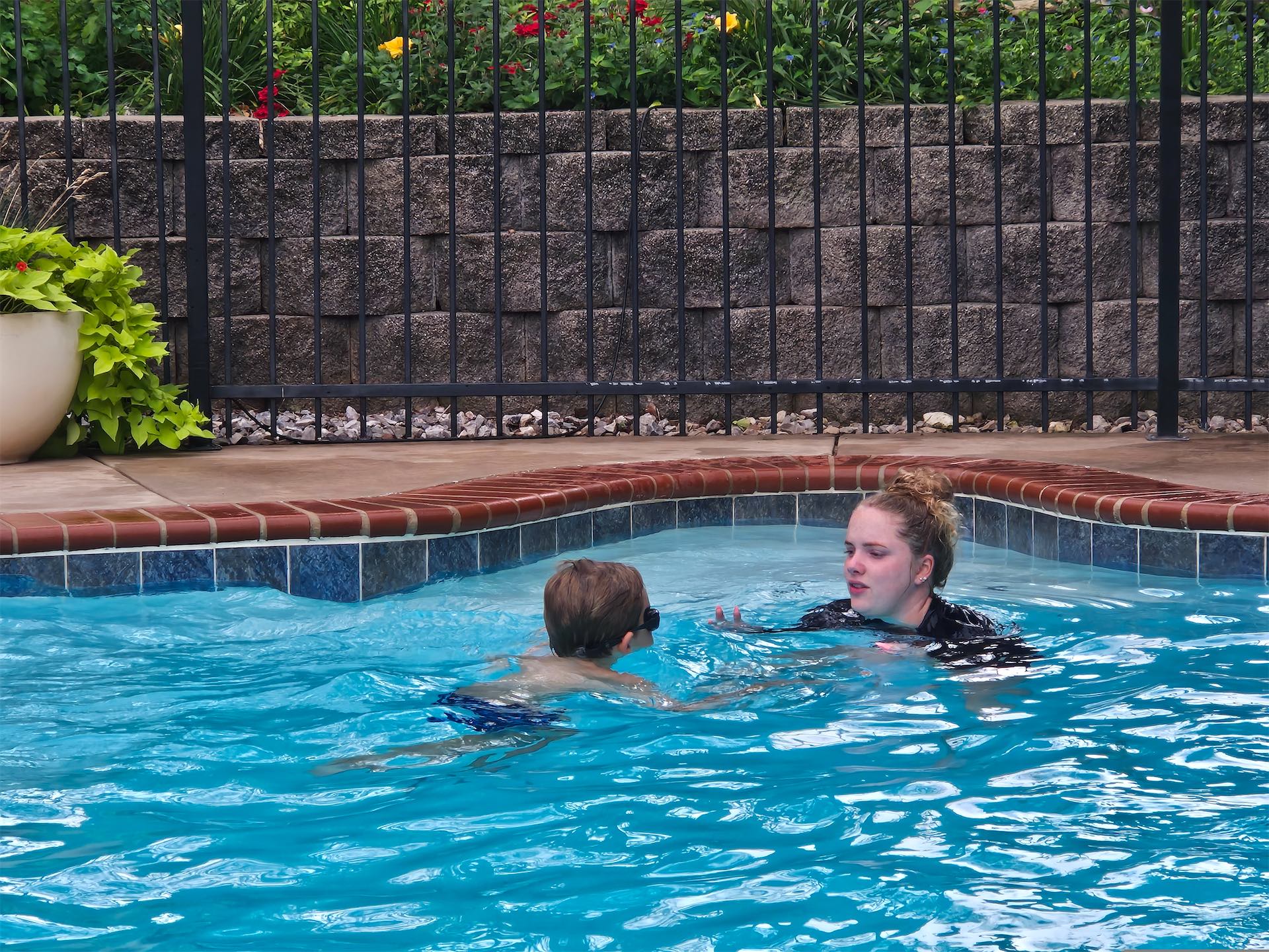 Summer outdoor swim lesson at the Like a Fish private pool in Guthrie