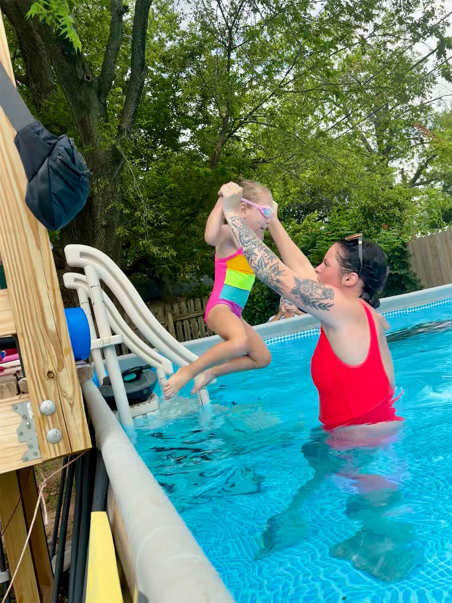 Young girl swimming freestyle during a private lesson in Oklahoma City